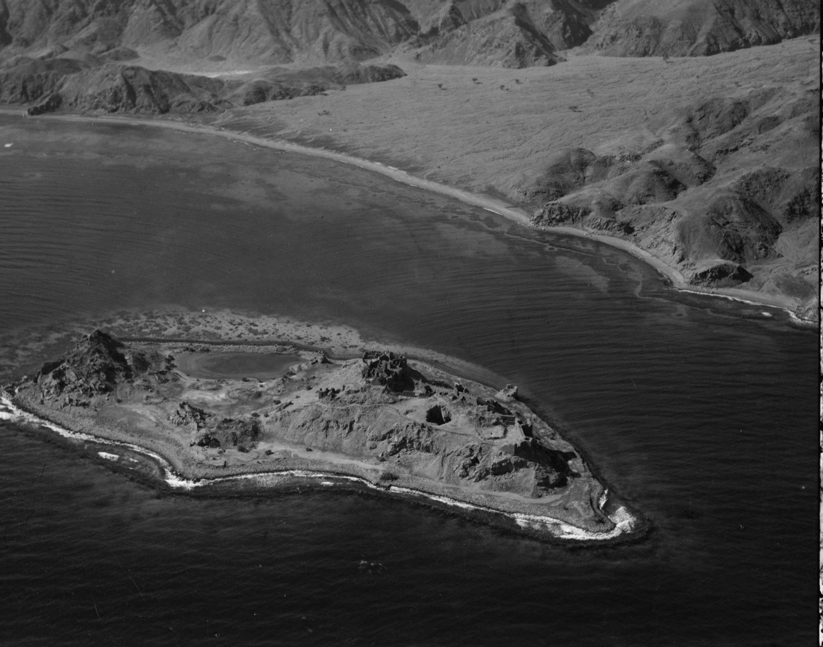 Flight to Ma'an el-Hadj, Petra, Wadi Rum and Akaba. Faraoun Island in Gulf of Akaba. Looking S.W. showing distinctly the Crusader castle