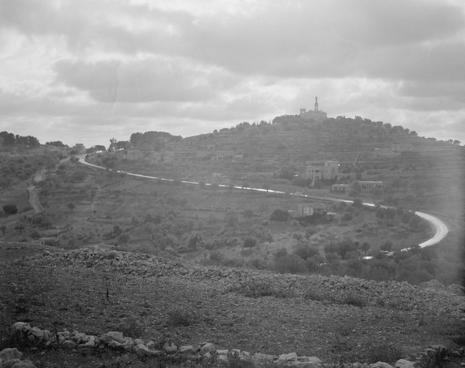 Church of the Apparition in Deir el Azhar at Abu Ghosh. Gen[eral] view of hill showing curved rd. [i.e. road] leading up