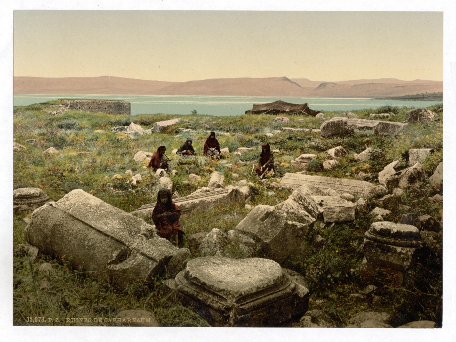 Fallen columns and carved stones among the ruins of Capernaum, on the shore of the Sea of Galilee, c. 1890–1900.